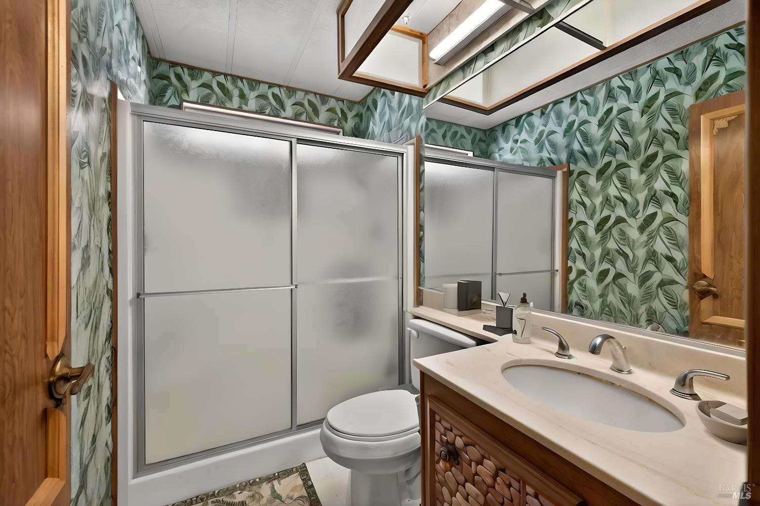 145 Círculo Todos Rohnert Park, CA 94928 - Photo 25 of 39 a bathroom with a sink toilet and shower