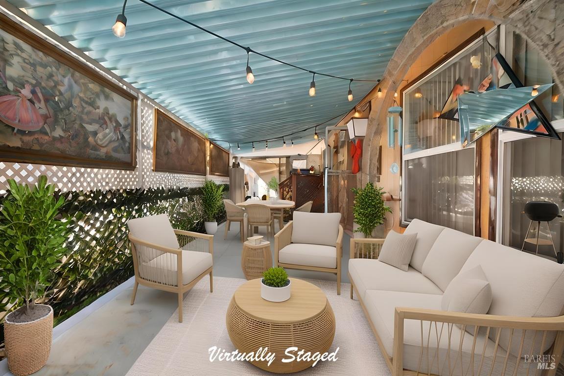 145 Círculo Todos Rohnert Park, CA 94928 - Photo 33 of 39 a outdoor living room with patio furniture and a potted plant
