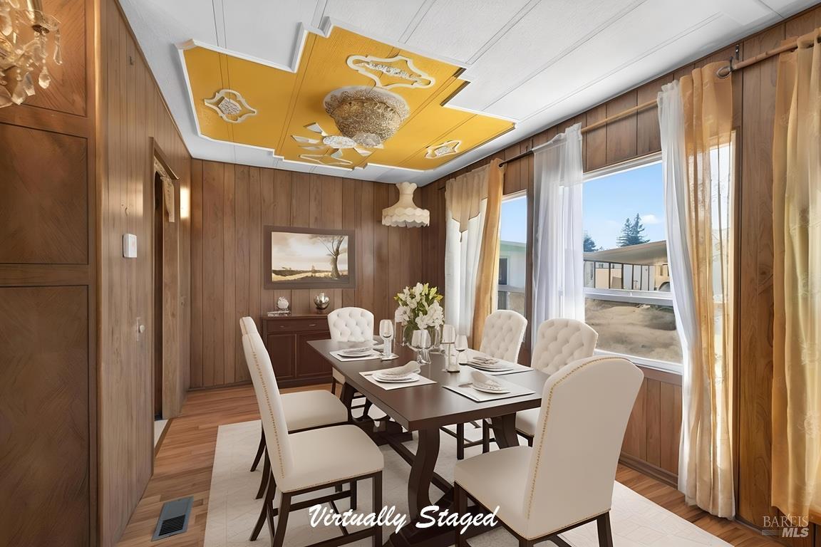 145 Círculo Todos Rohnert Park, CA 94928 - Photo 7 of 39 a view of a dining room with furniture window and wooden floor