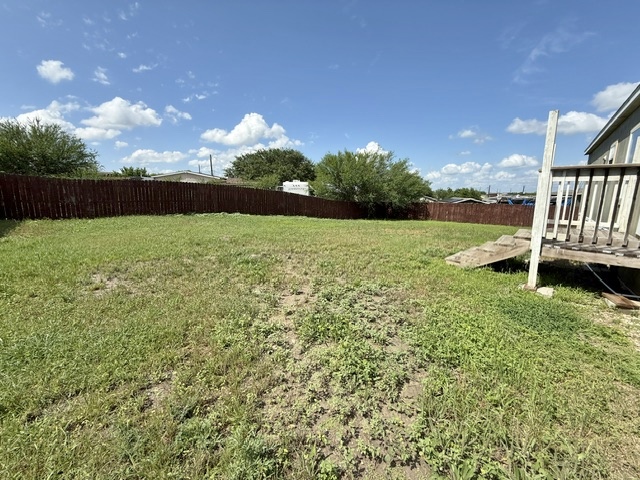 393 Duchess Pass Kyle, TX 78640 - Photo 13 of 14 A spacious backyard fully fence, perfect for outdoor activities.