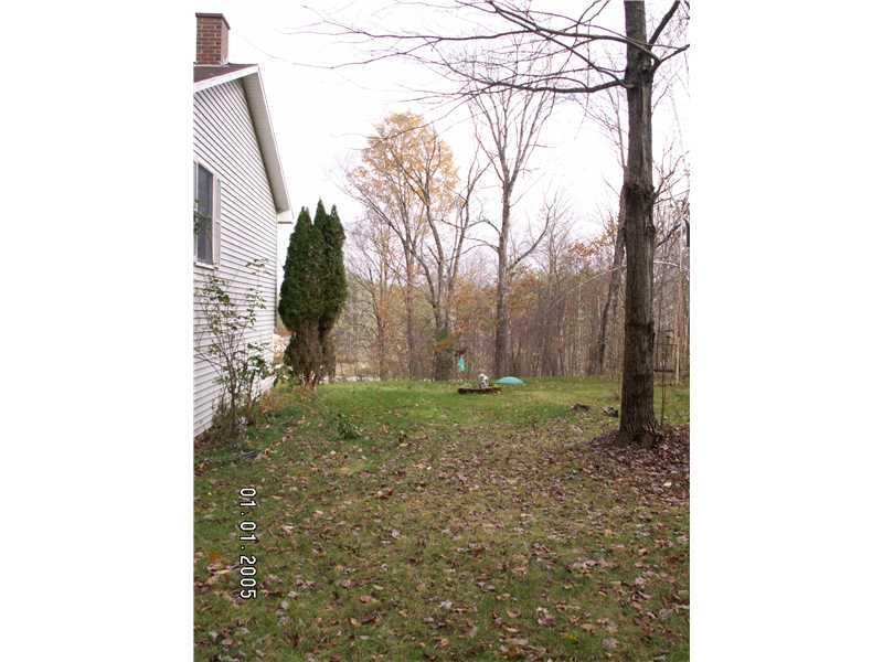 125 Jordan Road Mechanic Falls, ME 04256 - Photo 18 of 26 Exterior Side View. side yard