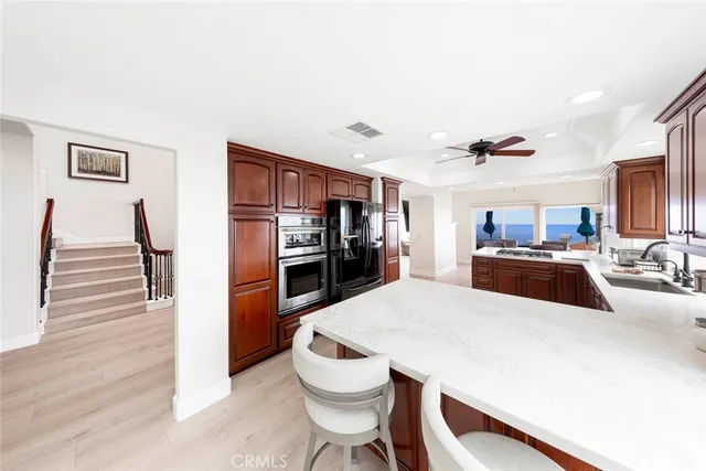 a bathroom with a sink vanity and a mirror
