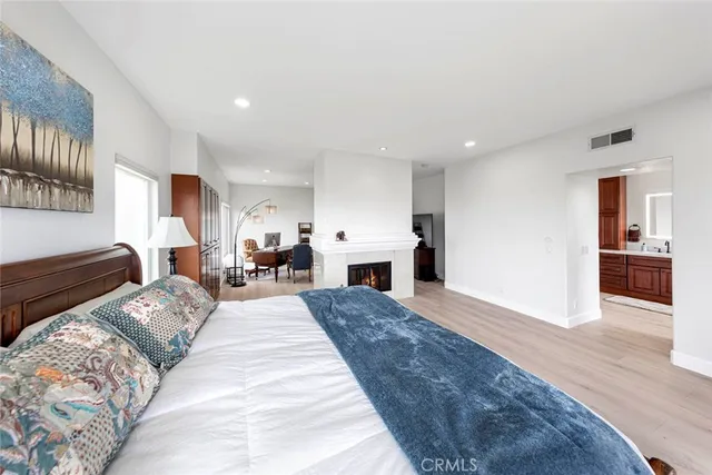a bathroom with a tub toilet and sink