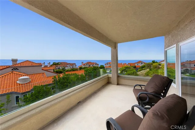 a view of swimming pool from a balcony
