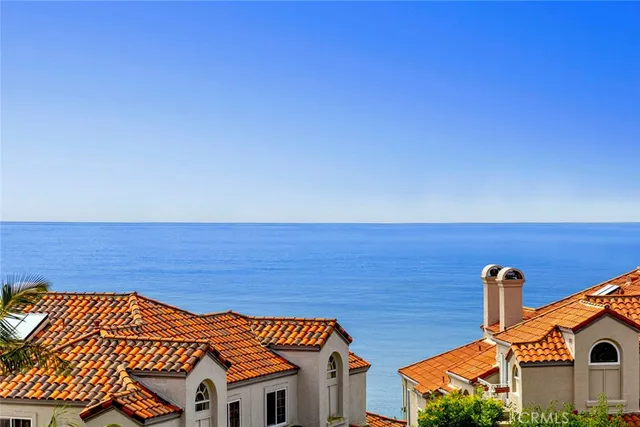 an aerial view of ocean and beach
