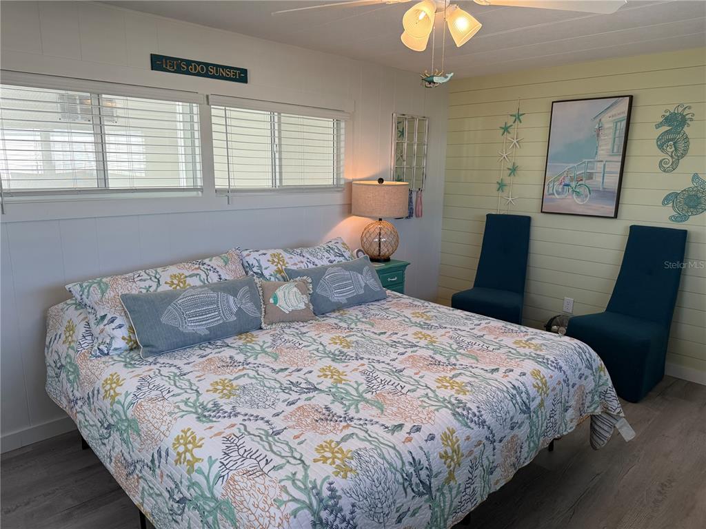 5691 Teahouse Road Venice, FL 34293 - Photo 17 of 31 a bedroom with a bed and window