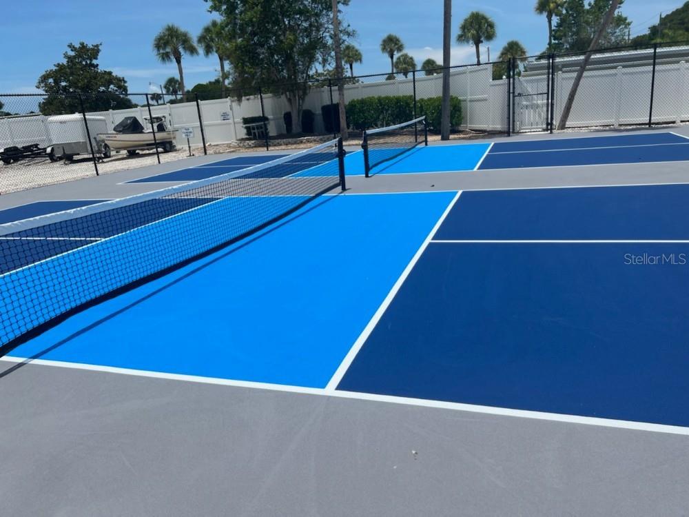 5691 Teahouse Road Venice, FL 34293 - Photo 26 of 31 a swimming pool with outdoor seating