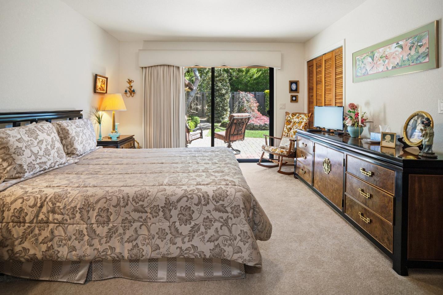 2911 Colton Road Pebble Beach, CA 93953 - Photo 36 of 46 a spacious bedroom with a bed and large windows