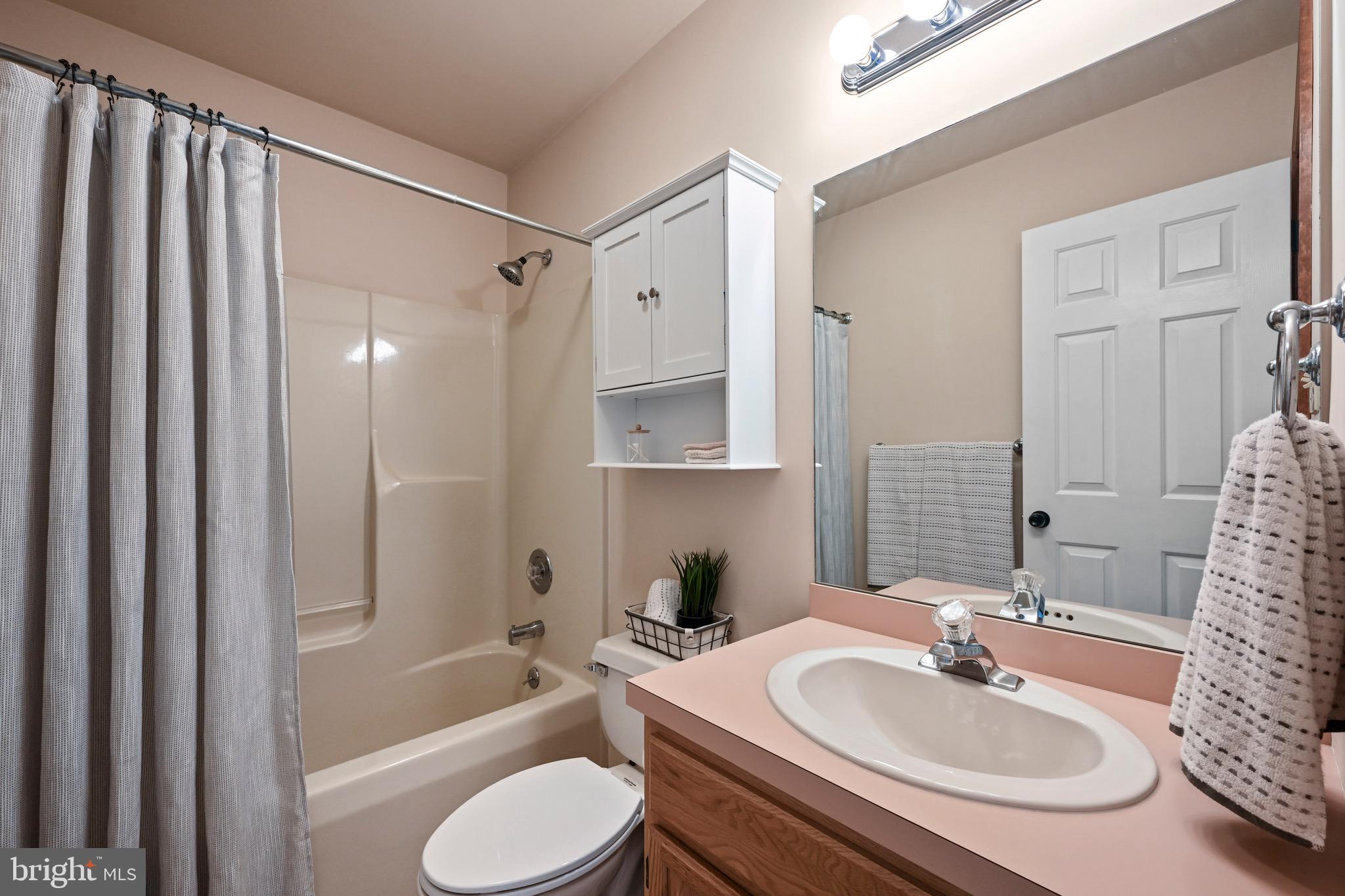329 Hunter Path Road Hummelstown, PA 17036 - Photo 18 of 37 a bathroom with a sink toilet tub and shower
