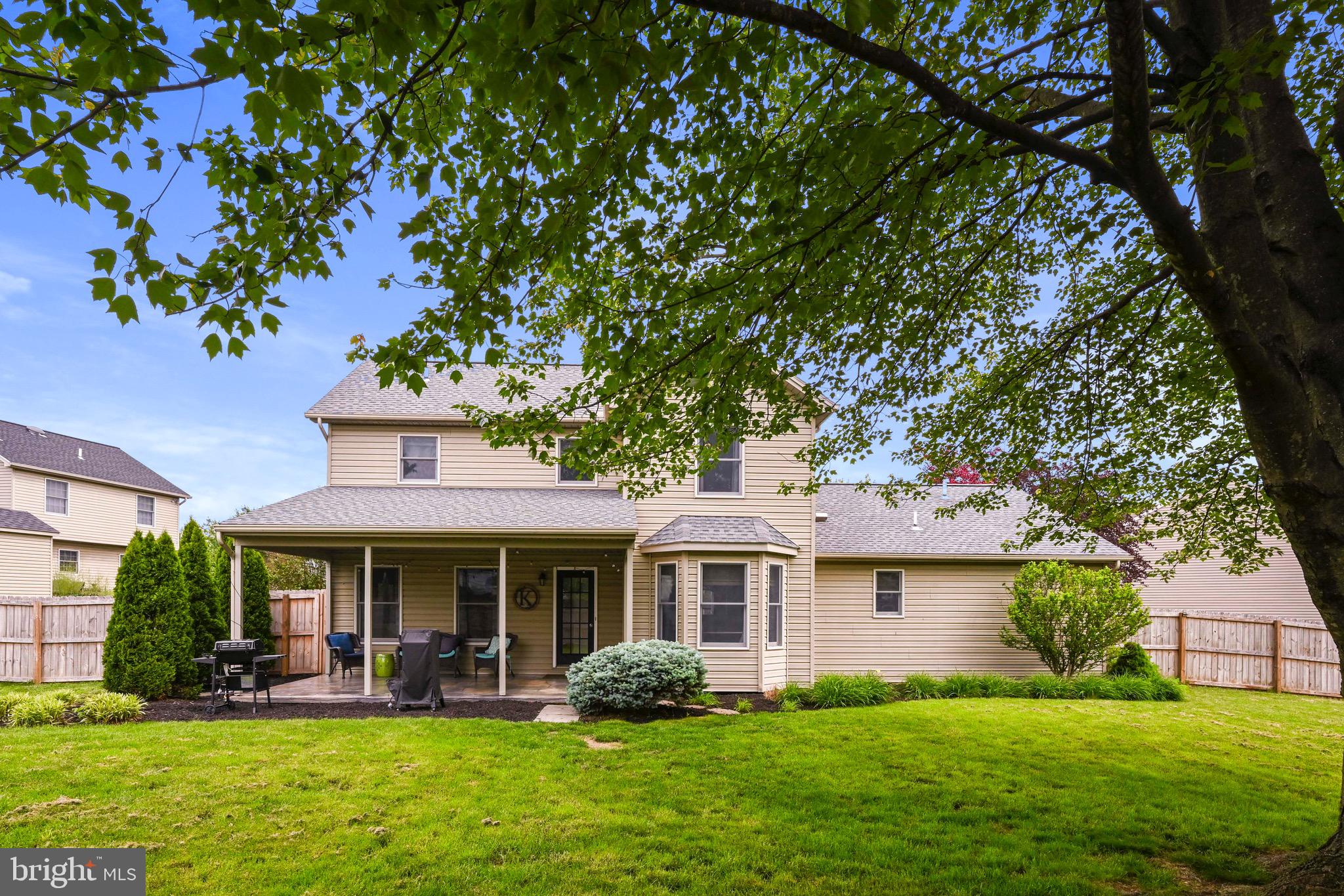 329 Hunter Path Road Hummelstown, PA 17036 - Photo 2 of 37 a front view of a house with garden