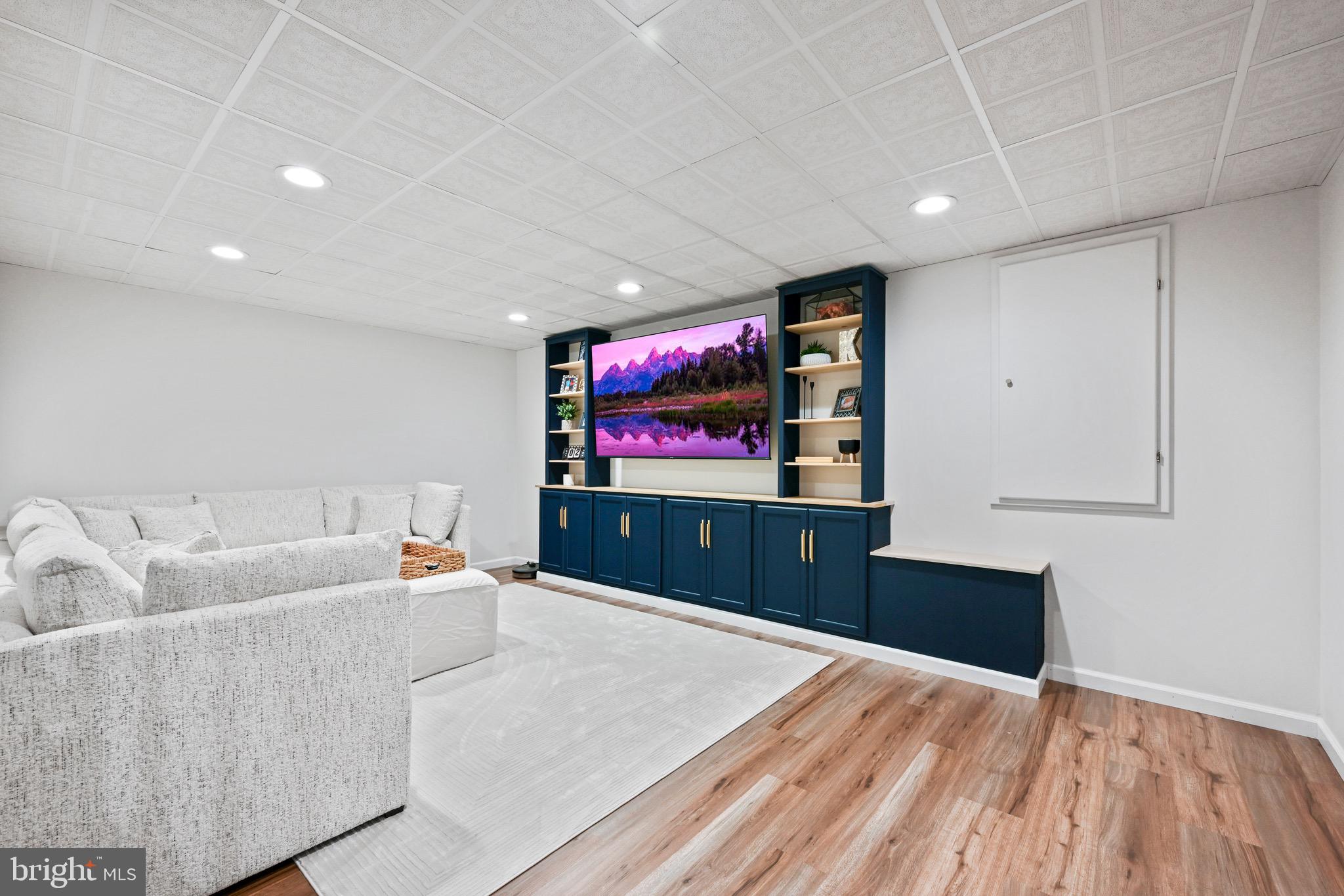329 Hunter Path Road Hummelstown, PA 17036 - Photo 21 of 37 a living room with furniture and flat screen tv