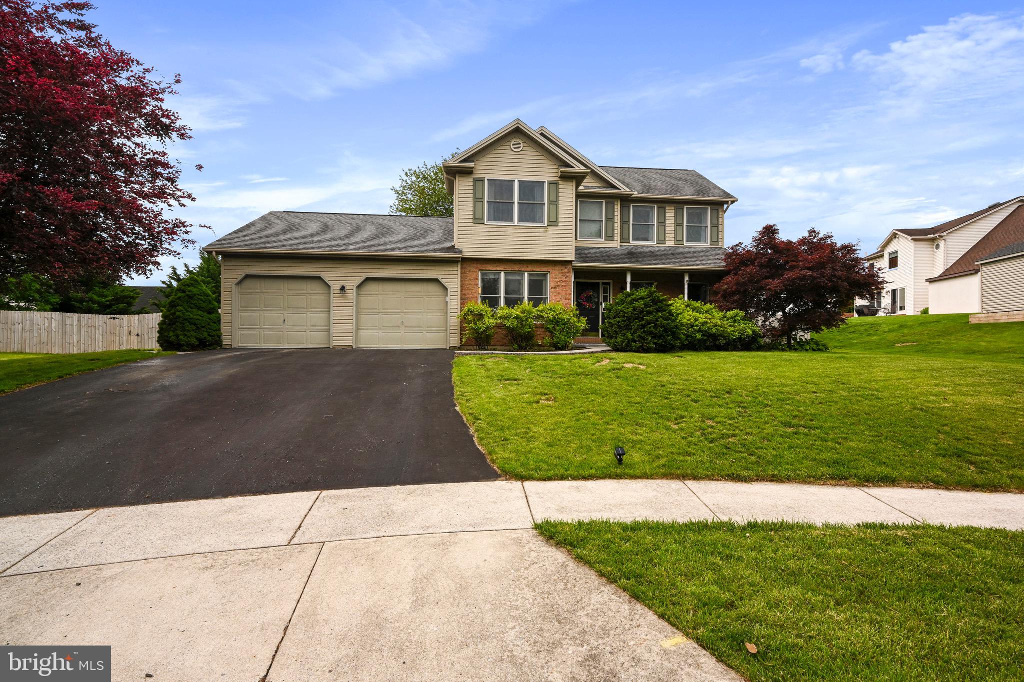 329 Hunter Path Road Hummelstown, PA 17036 - Photo 33 of 37 a front view of a house with a yard
