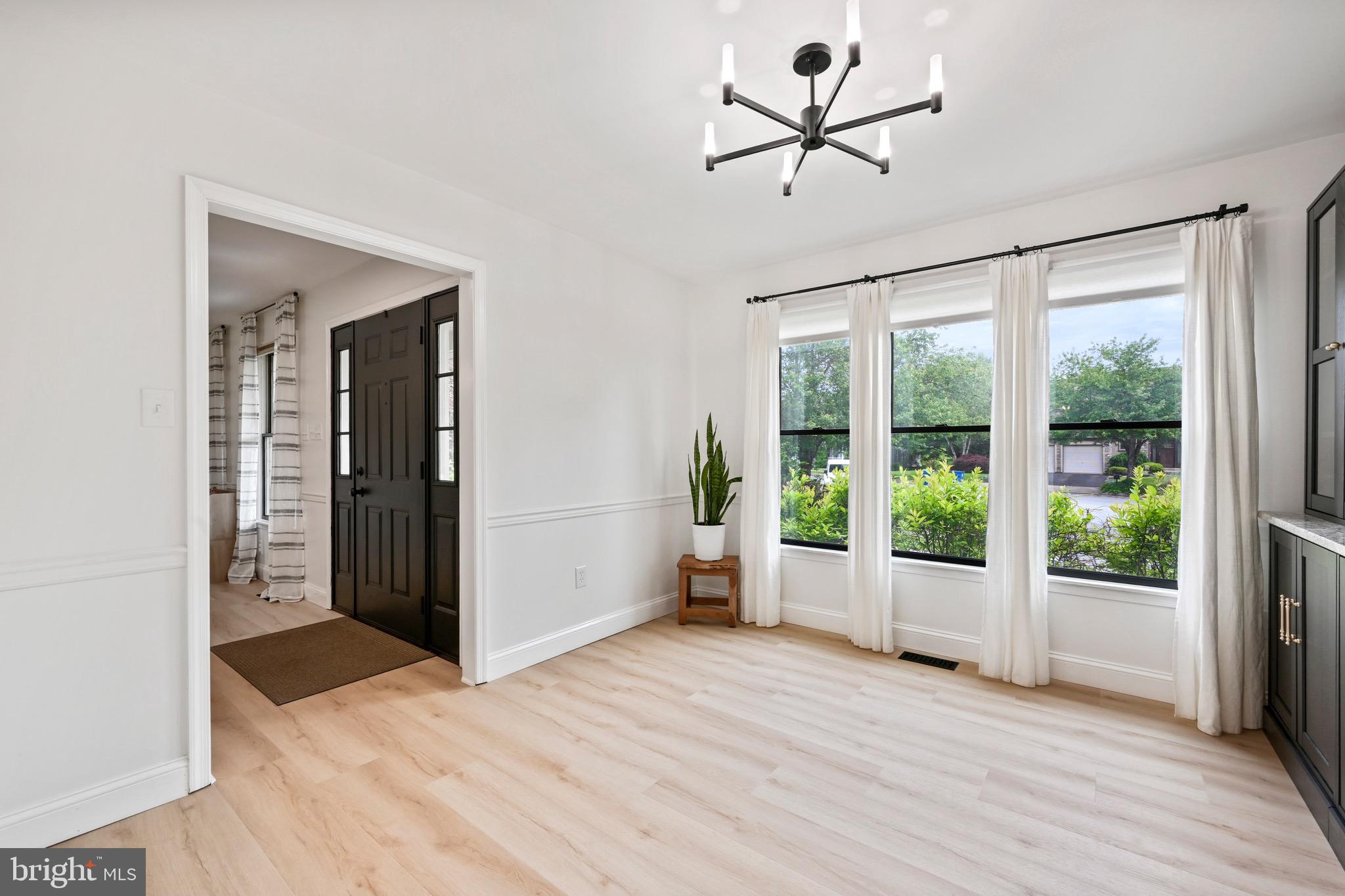 329 Hunter Path Road Hummelstown, PA 17036 - Photo 4 of 37 wooden floor in an empty room with a window