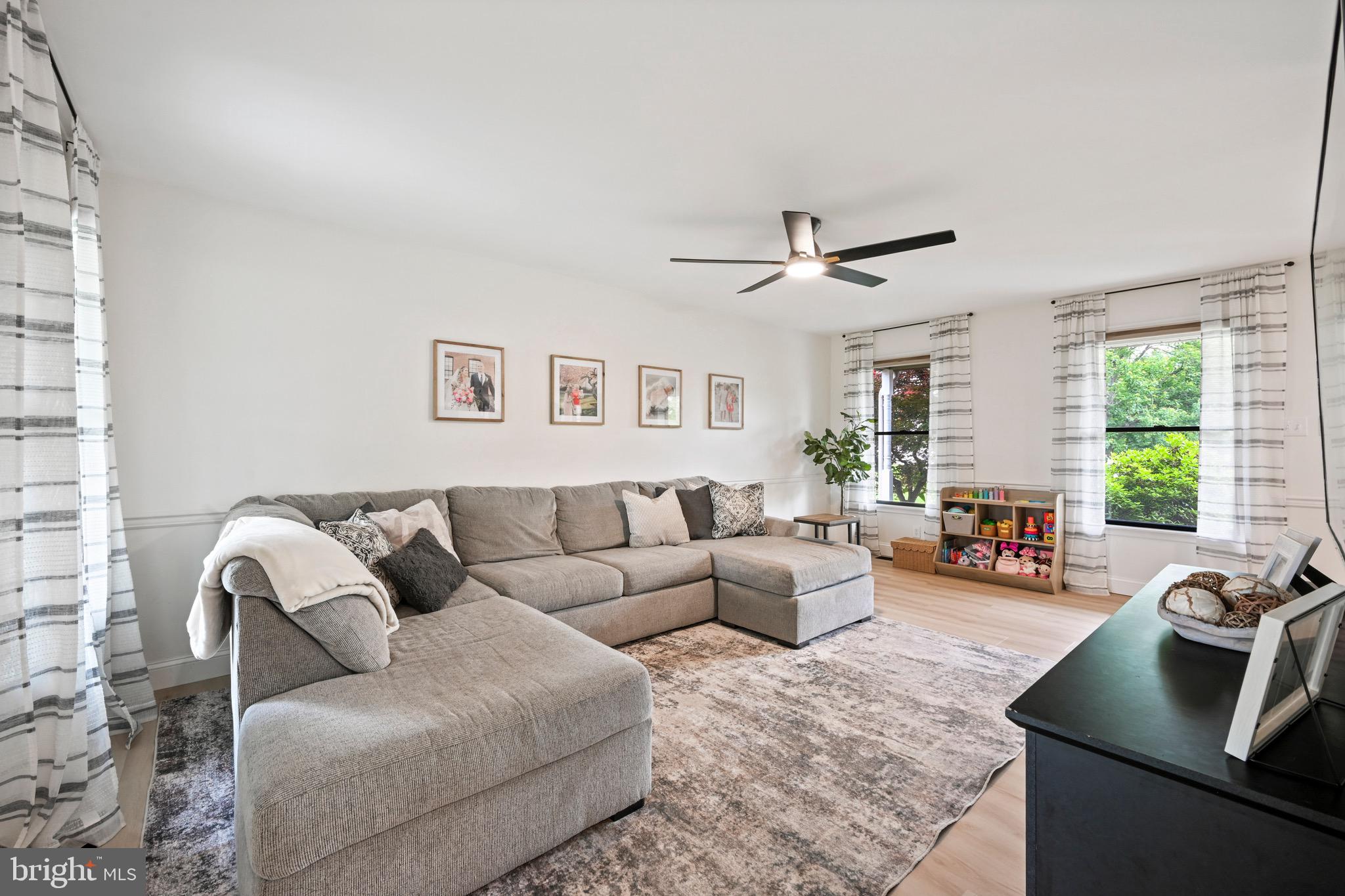 329 Hunter Path Road Hummelstown, PA 17036 - Photo 5 of 37 a living room with furniture and a large window