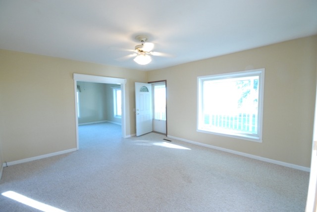 16129 Kelley Road Pecatonica, IL 61063 - Photo 8 of 22 a view of an empty room with a window