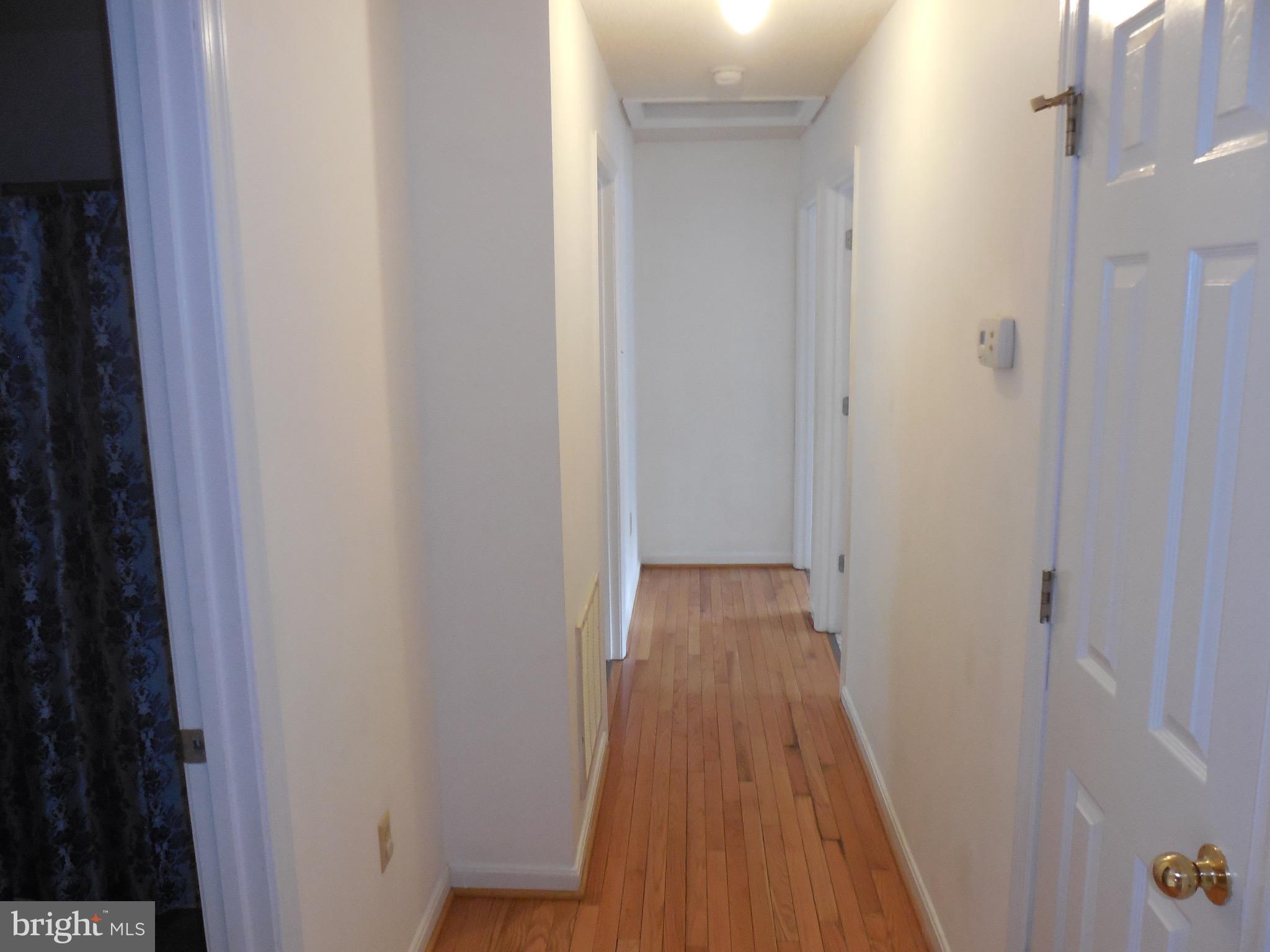 883 Valley Mill Road Winchester, VA 22602 - Photo 14 of 27 main hallway, hardwood floor