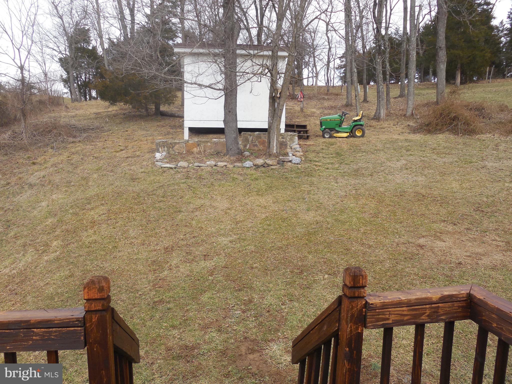 883 Valley Mill Road Winchester, VA 22602 - Photo 6 of 27 View of yard from deck, fencing at back of lot