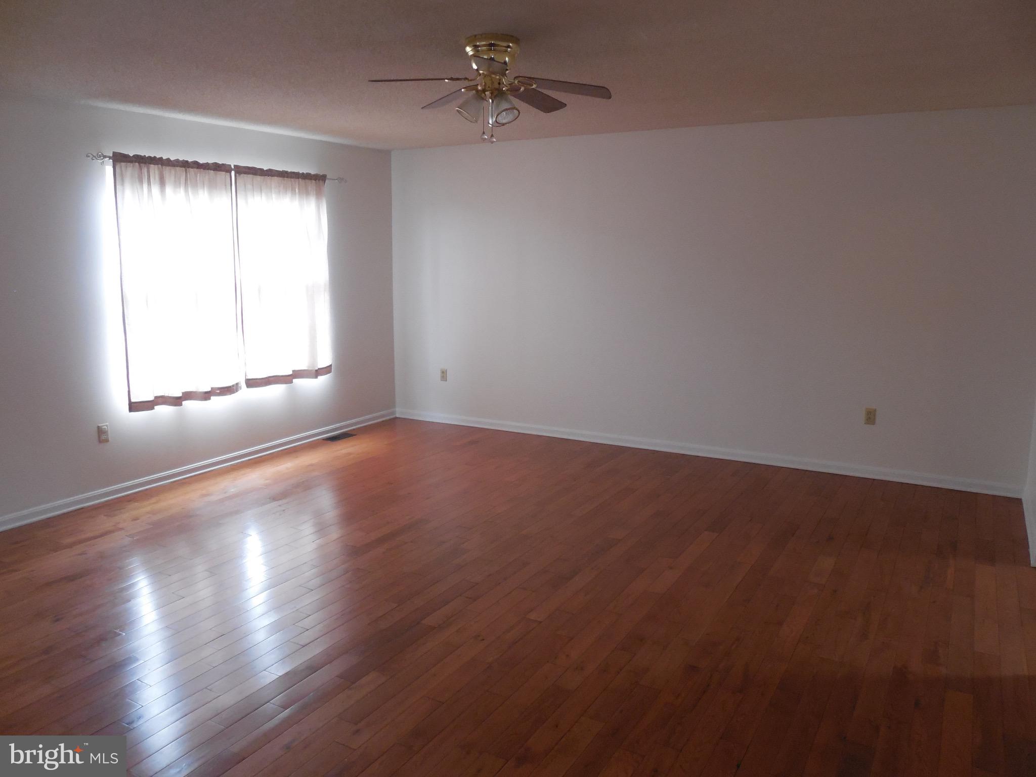 883 Valley Mill Road Winchester, VA 22602 - Photo 9 of 27 Living Room, hardwood floor, ceiling fan