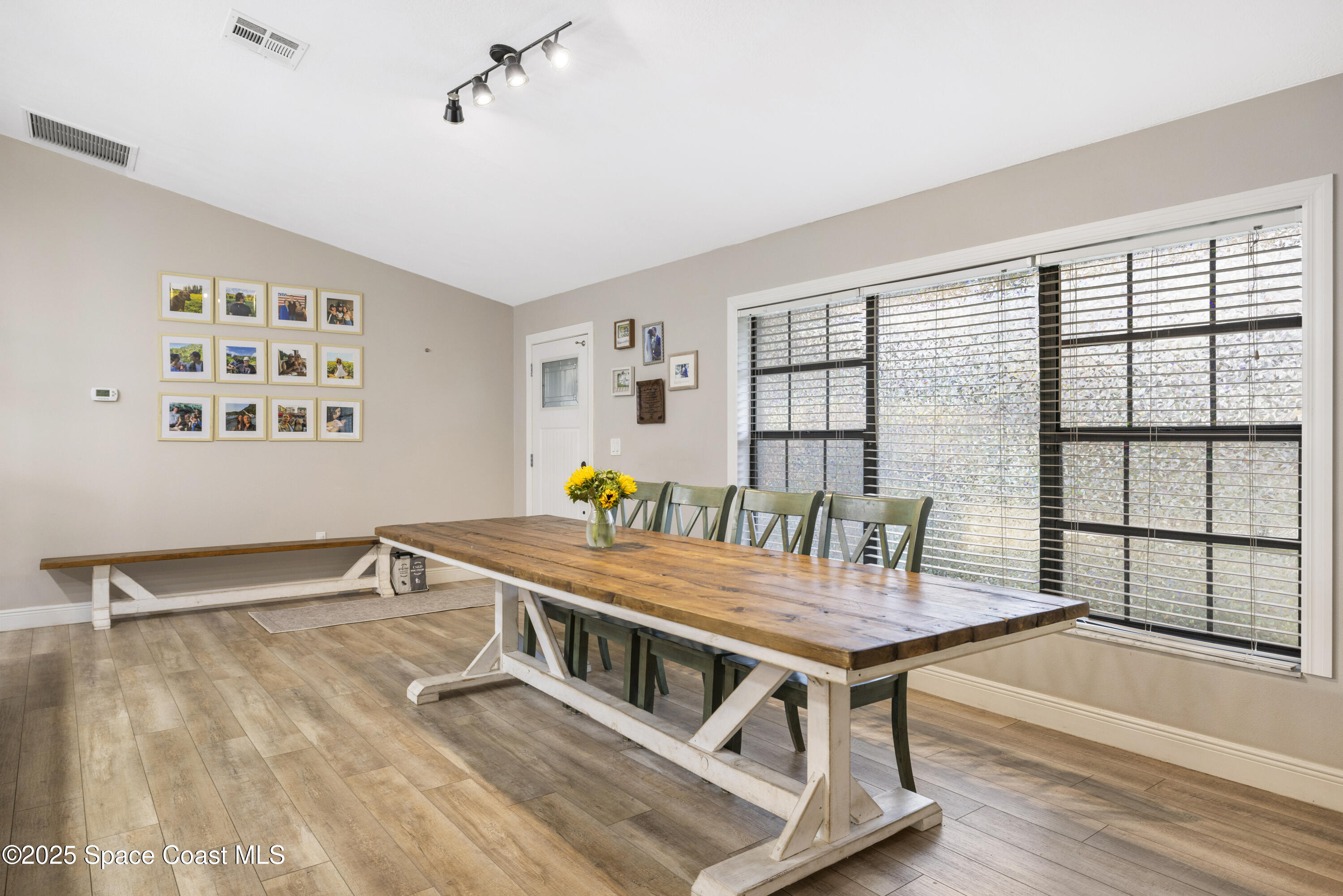 456 Narragansett Street Northeast Palm Bay, FL 32907 - Photo 16 of 43 a workspace with furniture and window