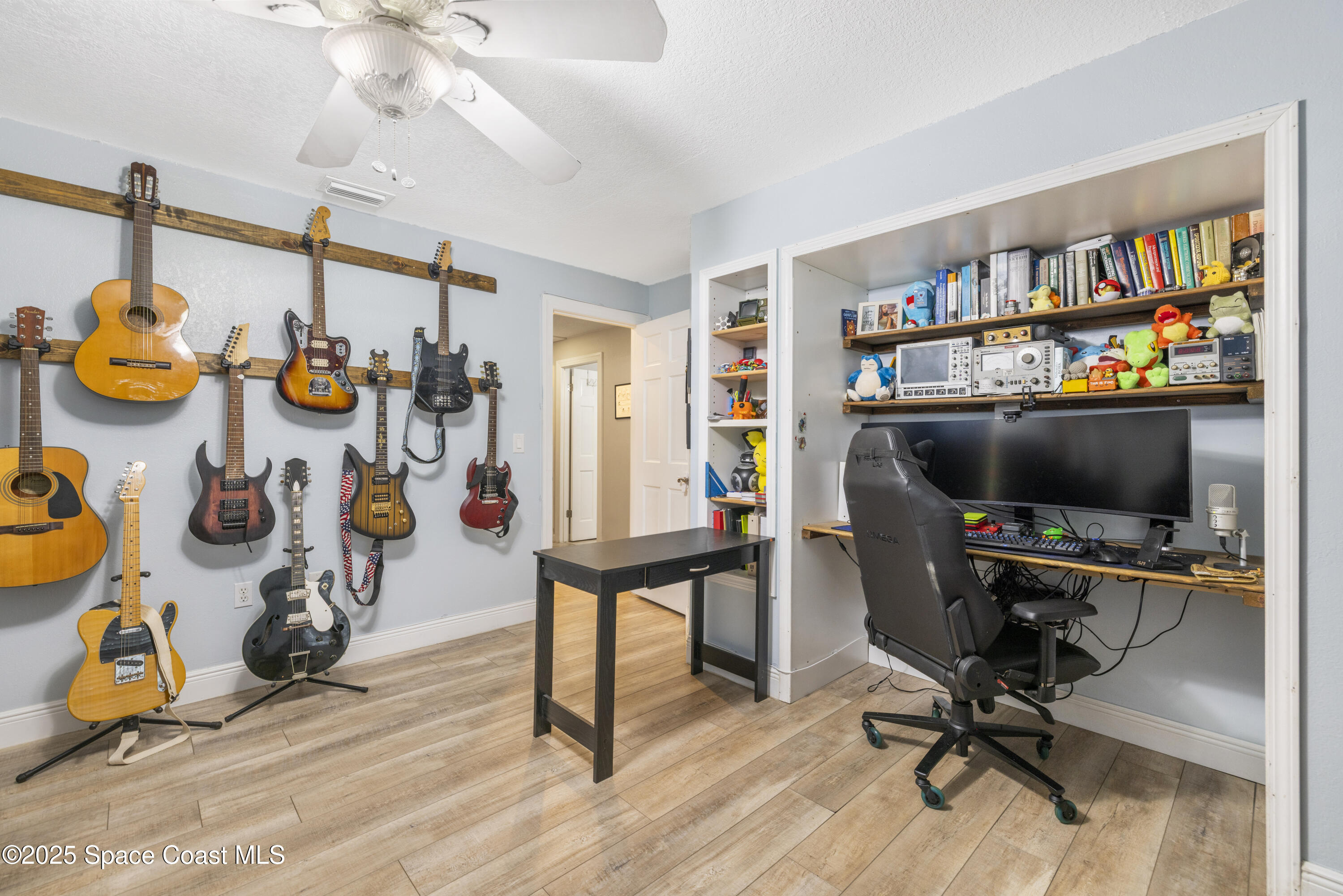 456 Narragansett Street Northeast Palm Bay, FL 32907 - Photo 30 of 43 a view of a workspace with furniture and a window