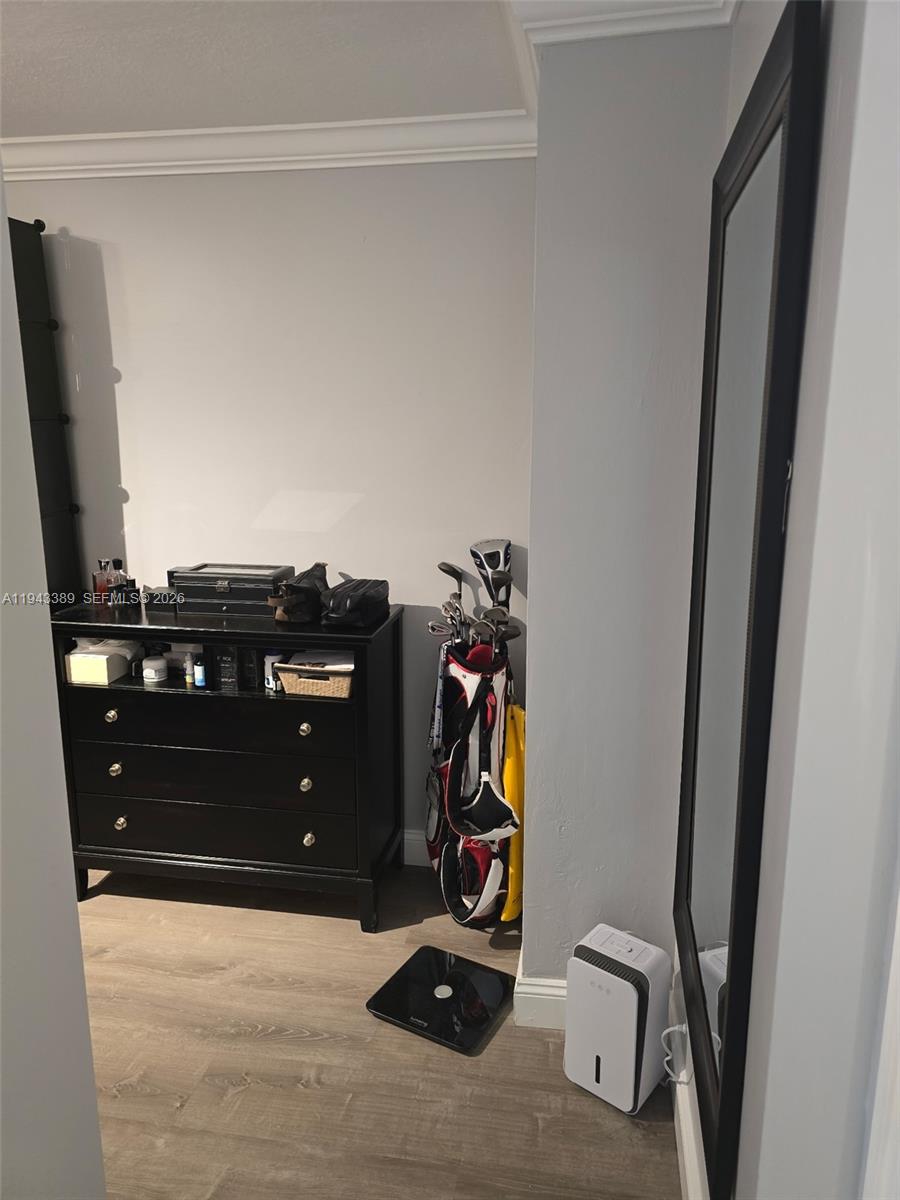 7753 Southwest 102nd Place Miami, FL 33173 - Photo 11 of 18 a room with furniture and closet