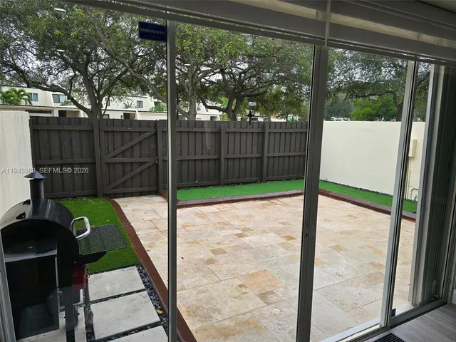 a view of a porch with seating space