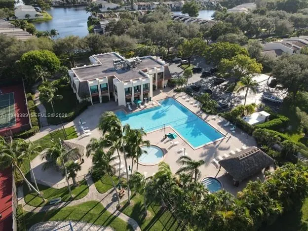 an aerial view of a house with outdoor space