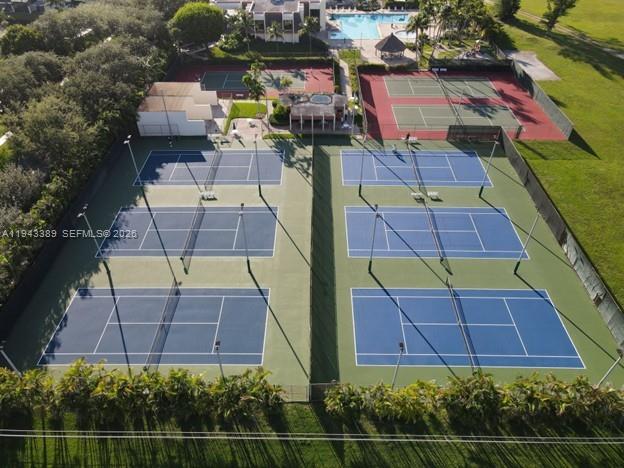 7753 Southwest 102nd Place Miami, FL 33173 - Photo 18 of 18 an aerial view of a house with a yard and potted plants