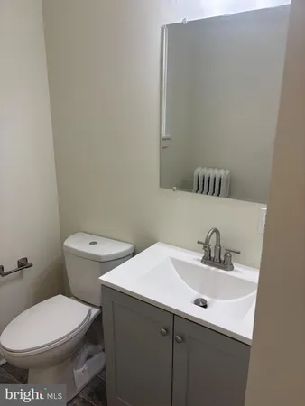 a bathroom with a sink and a toilet