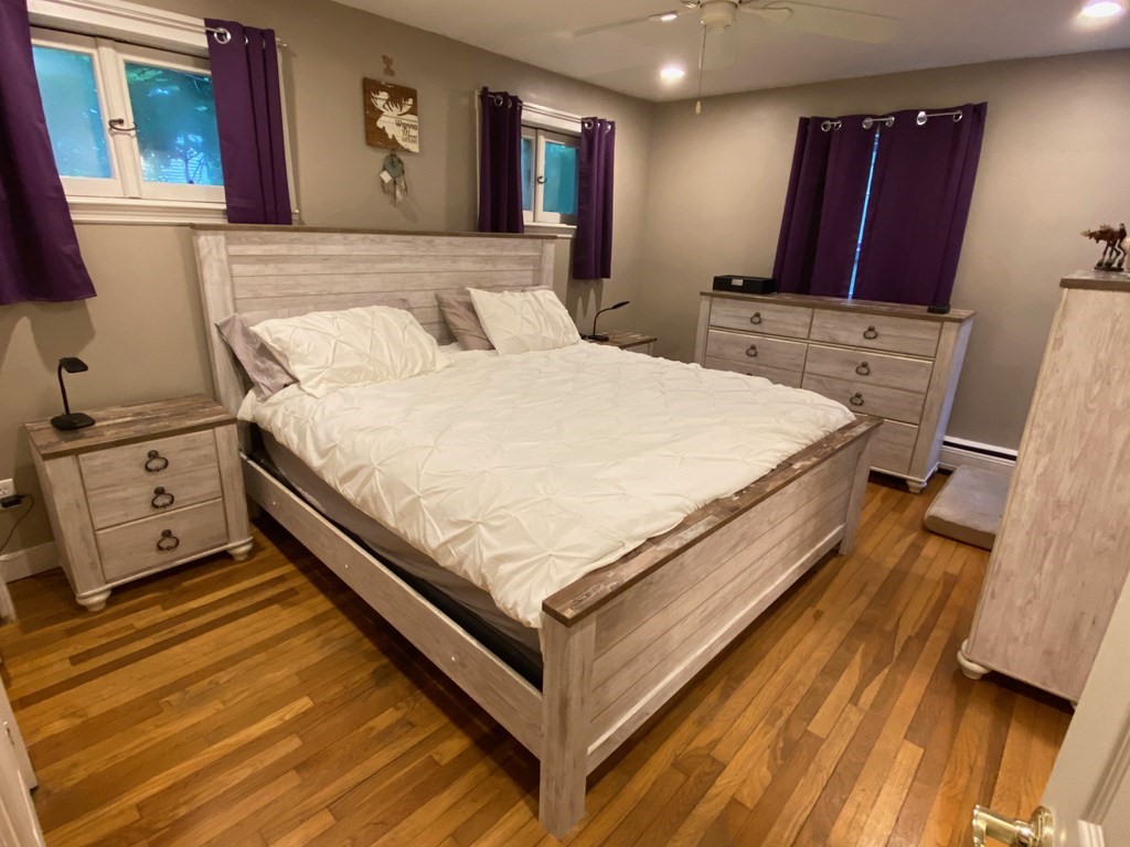 16 Worcester Road Townsend, MA 01469 - Photo 13 of 31 a bed room with a bed and a television