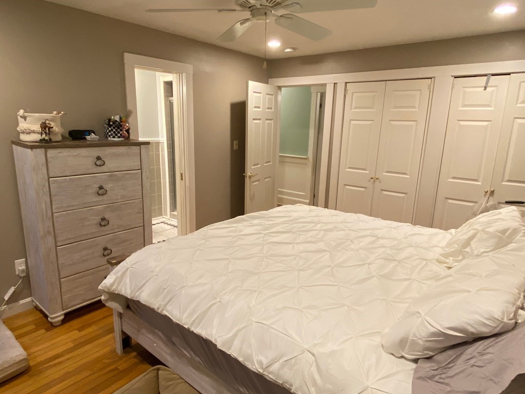 16 Worcester Road Townsend, MA 01469 - Photo 14 of 31 a bedroom with a bed and cabinet