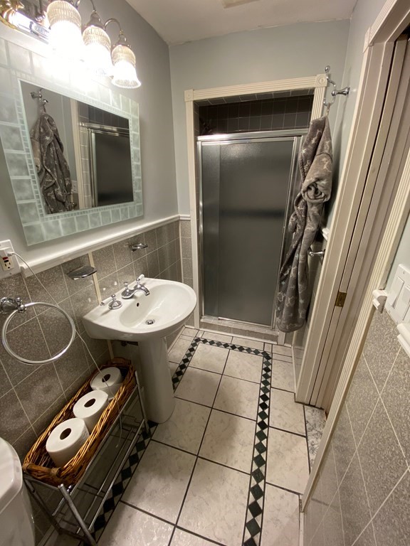 16 Worcester Road Townsend, MA 01469 - Photo 15 of 31 a bathroom with a sink toilet and mirror