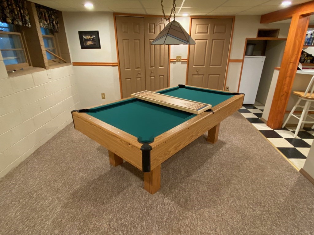 16 Worcester Road Townsend, MA 01469 - Photo 20 of 31 a room with pool table and a chandelier