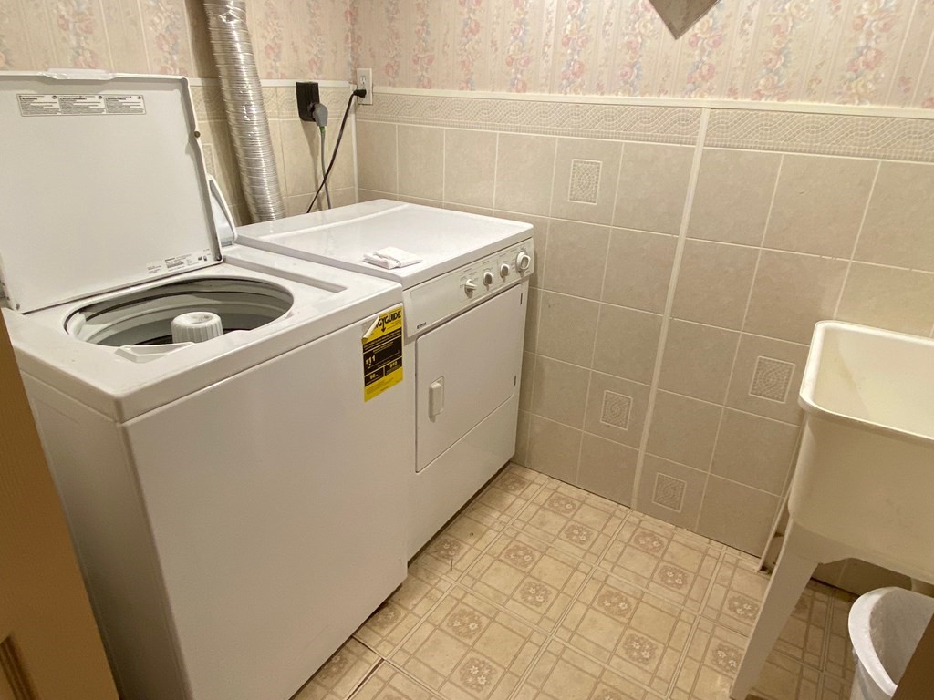 16 Worcester Road Townsend, MA 01469 - Photo 21 of 31 a utility room with dryer and washer