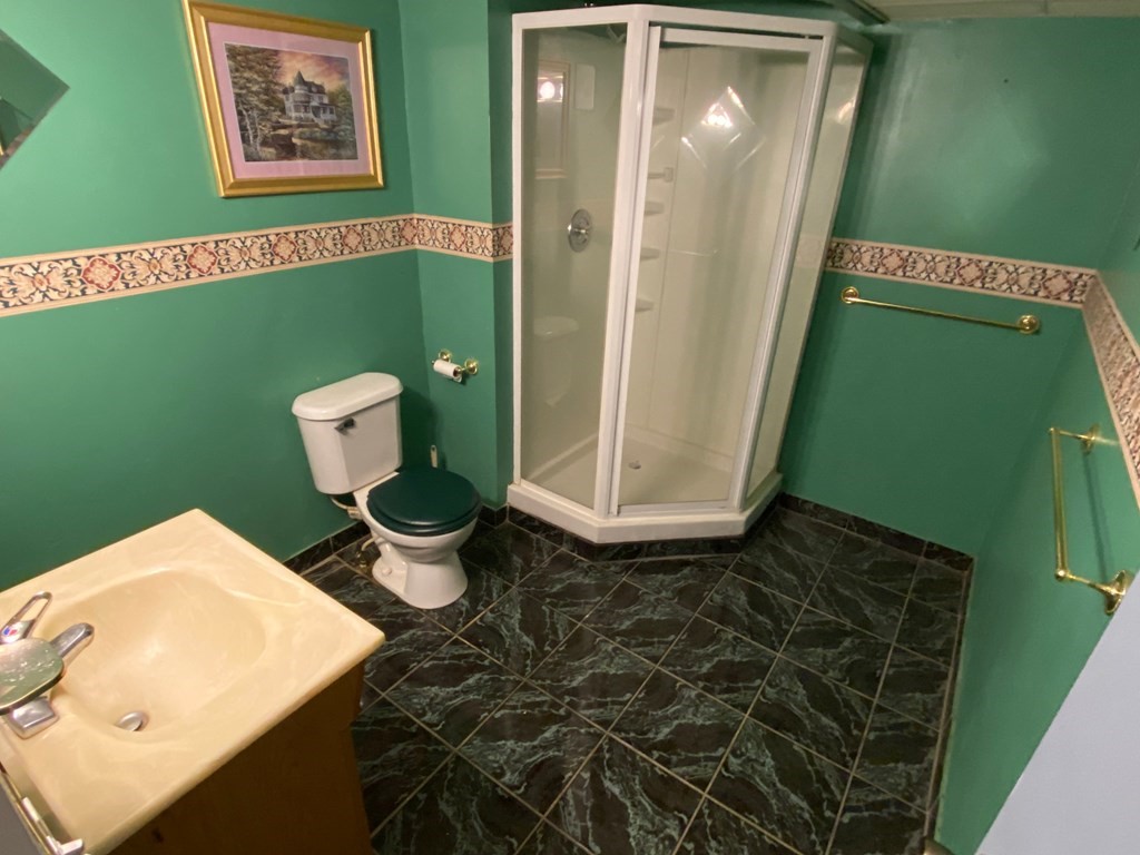 16 Worcester Road Townsend, MA 01469 - Photo 26 of 31 a bathroom with a toilet and a sink