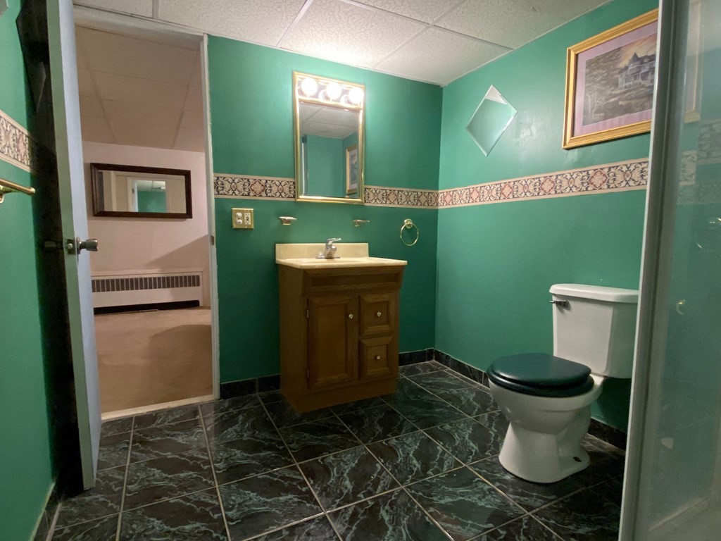 16 Worcester Road Townsend, MA 01469 - Photo 27 of 31 a bathroom with a toilet and a sink