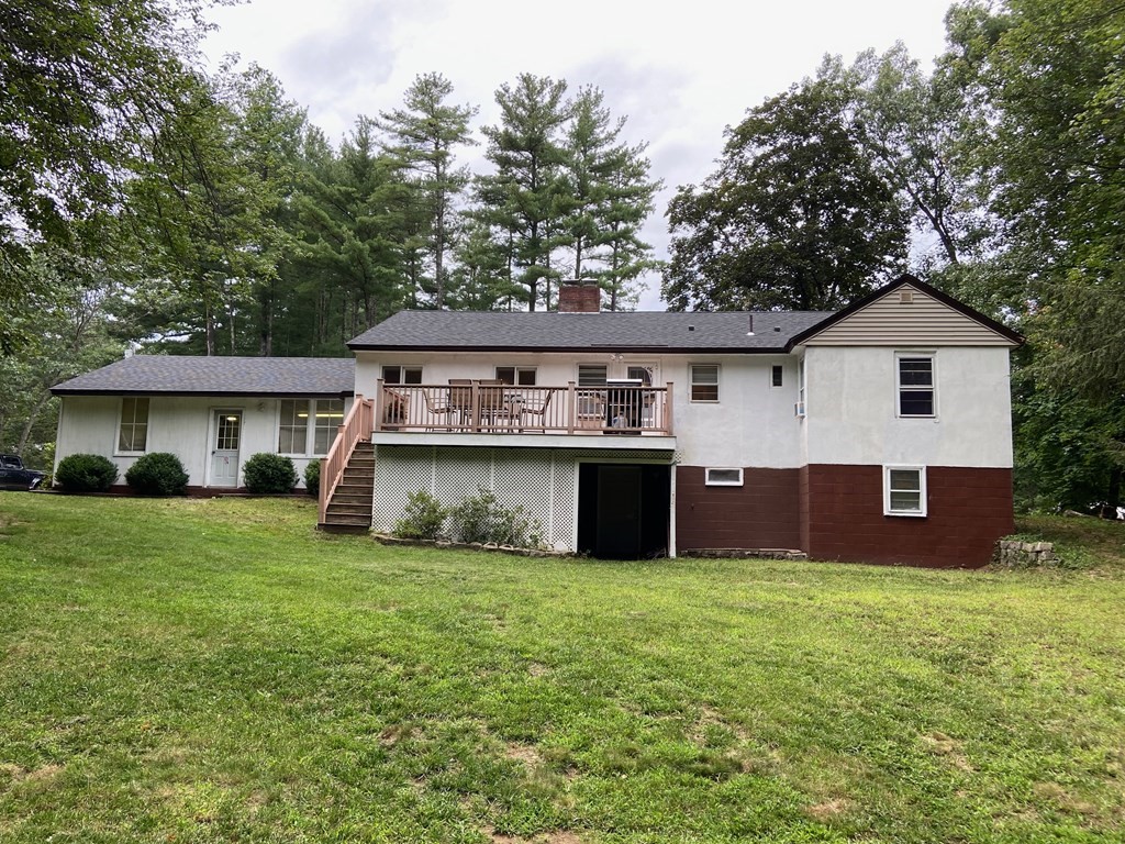 16 Worcester Road Townsend, MA 01469 - Photo 29 of 31 a view of a house with a yard and sitting area