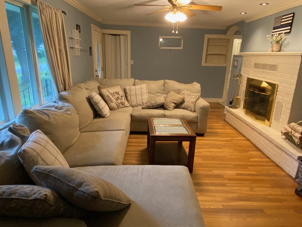 16 Worcester Road Townsend, MA 01469 - Photo 7 of 31 a living room with furniture and a fireplace