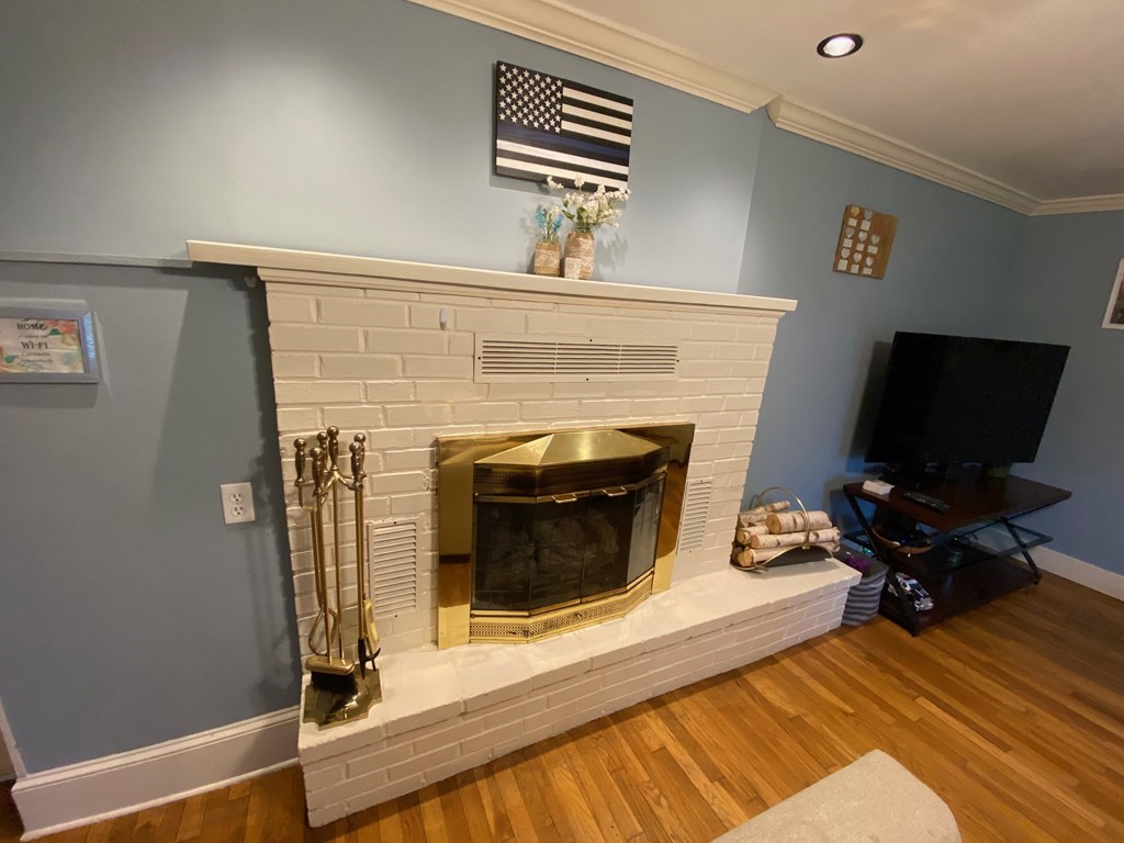 16 Worcester Road Townsend, MA 01469 - Photo 8 of 31 a living room with furniture and a fireplace