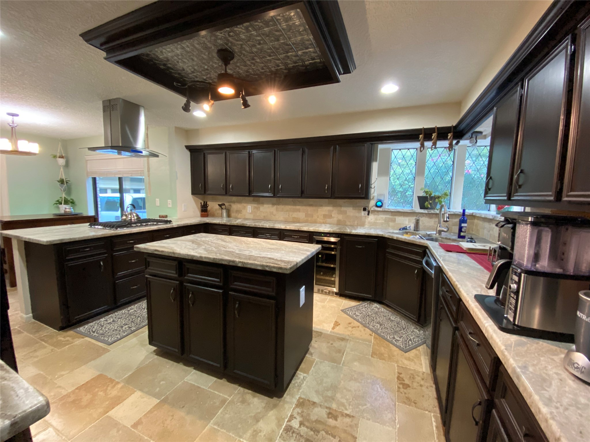 28 Tangle Brush Drive Spring, TX 77381 - Photo 14 of 29 a kitchen with a sink stove and cabinets
