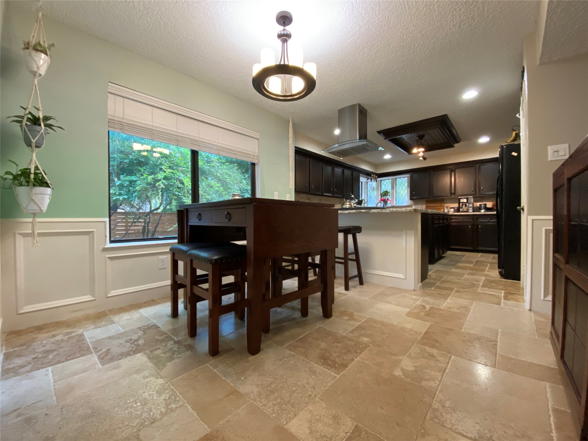28 Tangle Brush Drive Spring, TX 77381 - Photo 15 of 29 a kitchen with a table and chairs in it