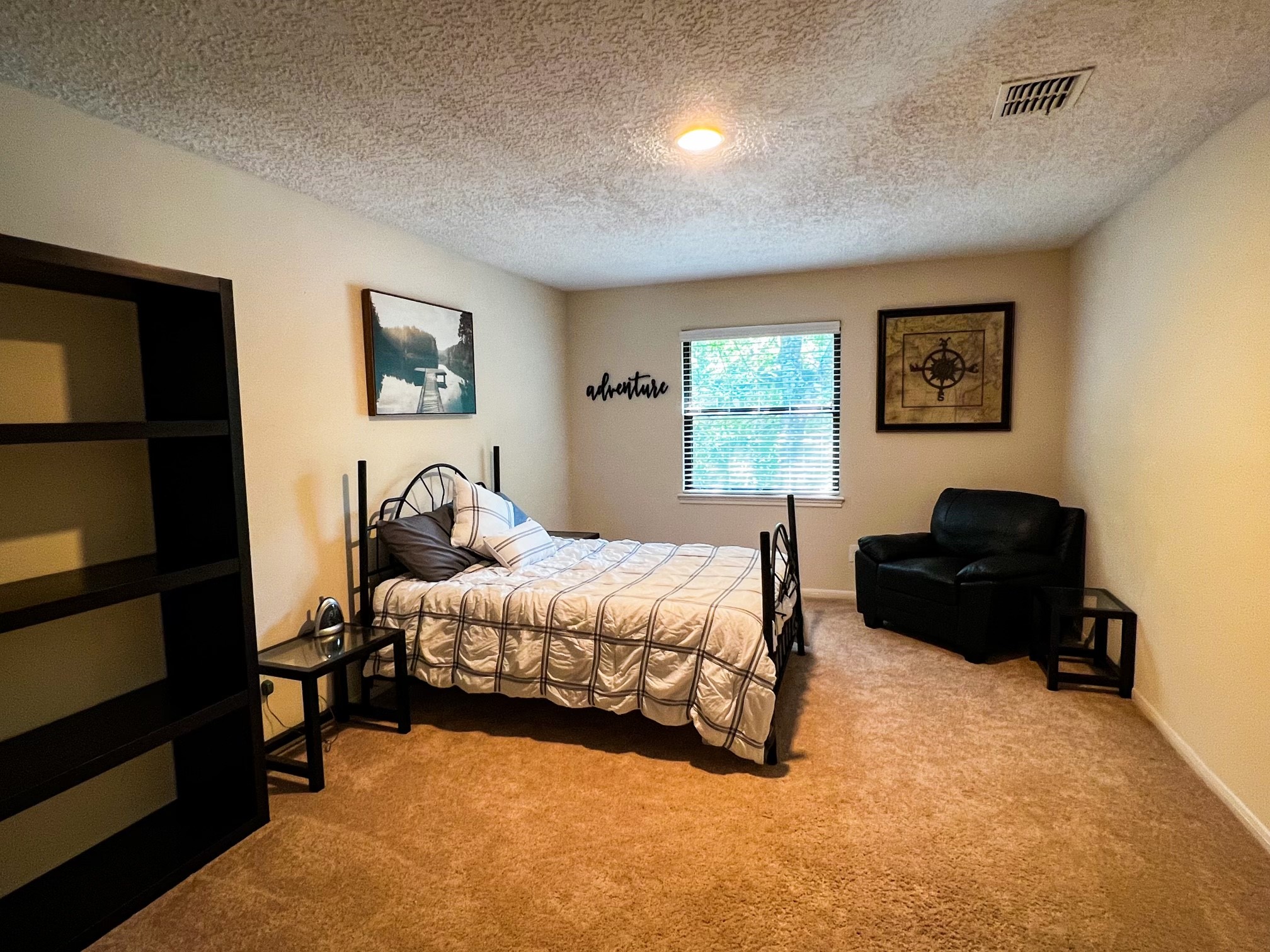 28 Tangle Brush Drive Spring, TX 77381 - Photo 24 of 29 a bedroom with a bed and a window