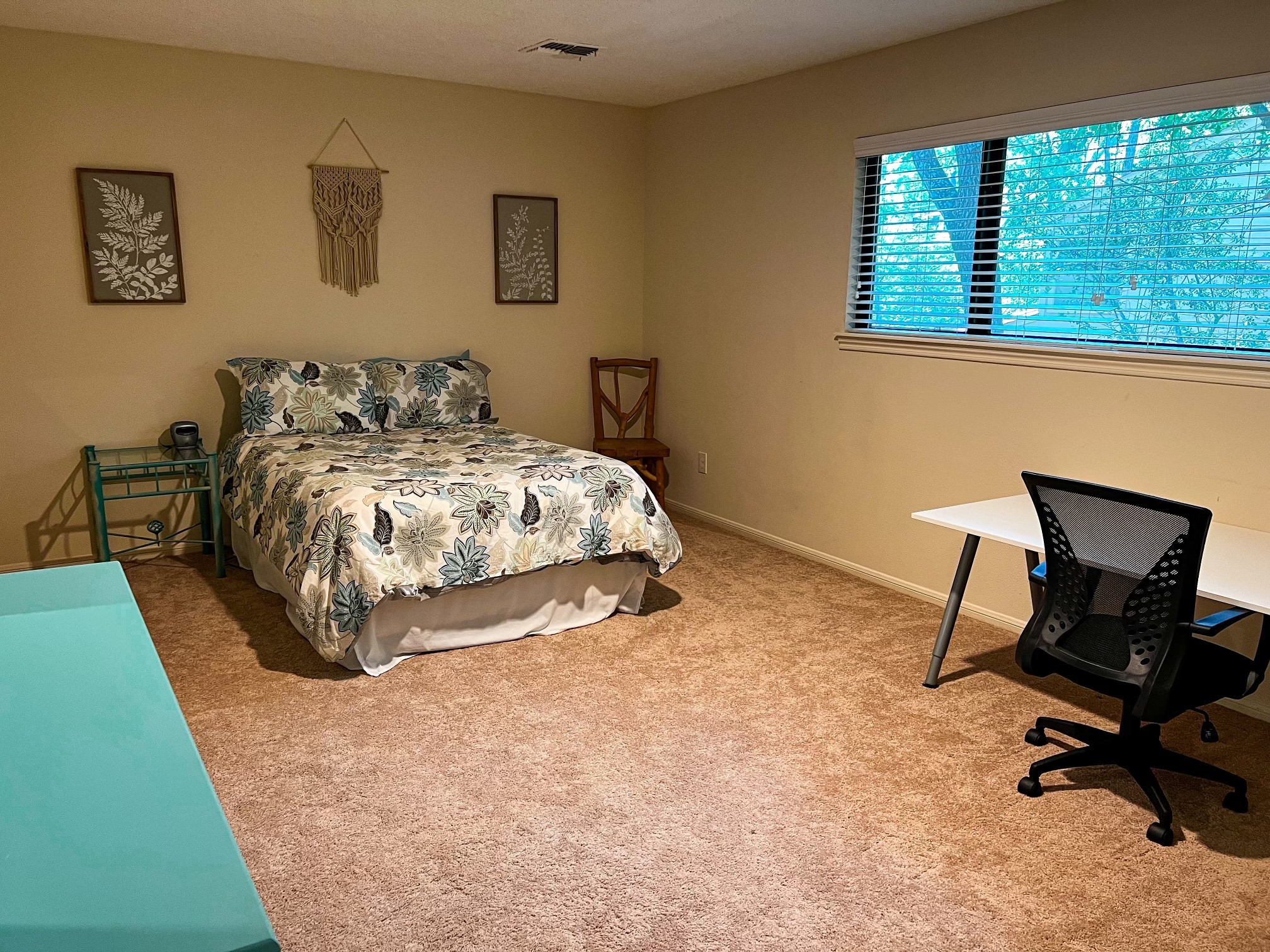 28 Tangle Brush Drive Spring, TX 77381 - Photo 25 of 29 a bed sitting in a bedroom next to a window