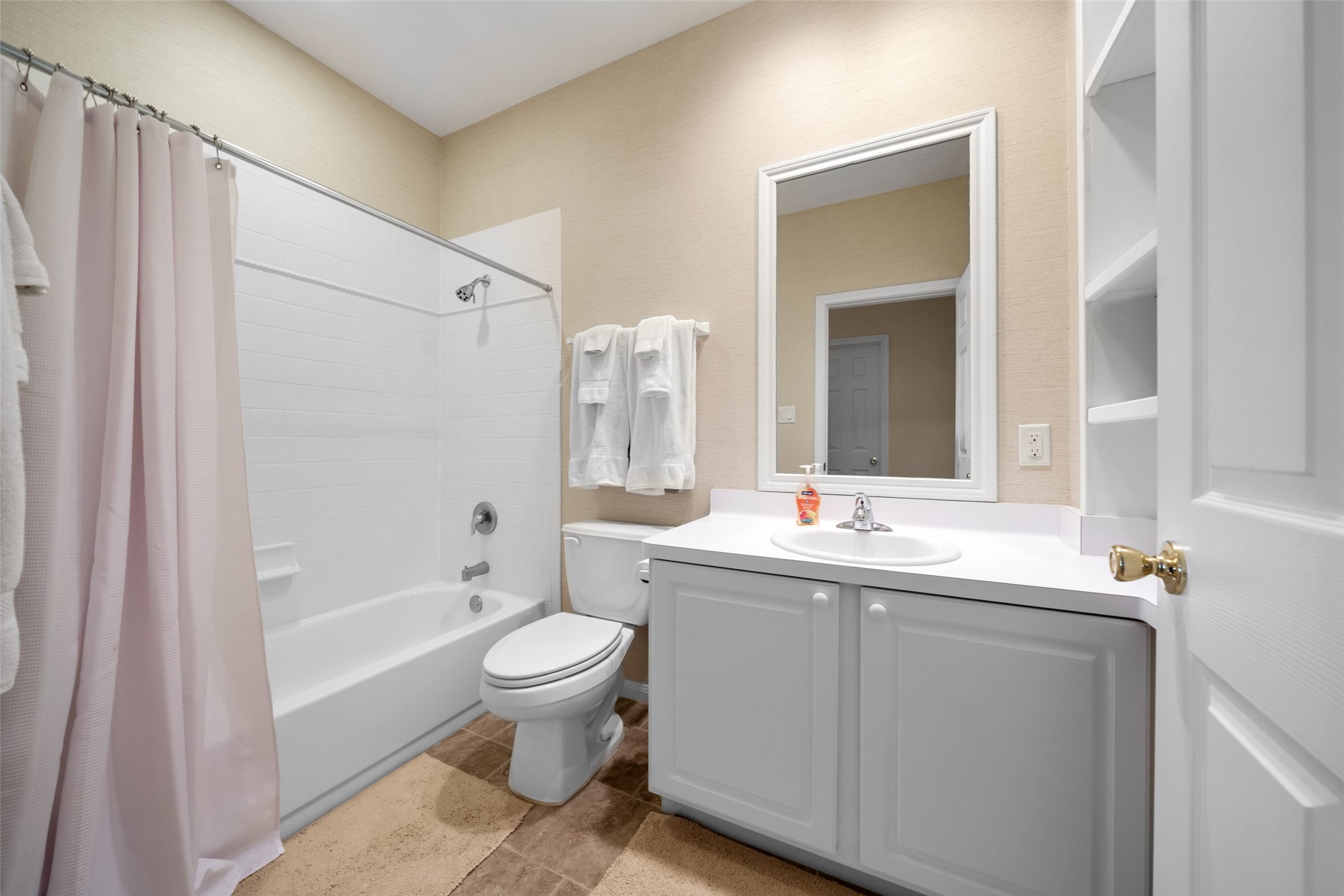 15144 Paradise View Drive Willis, TX 77318 - Photo 28 of 44 a bathroom with a sink a toilet and shower