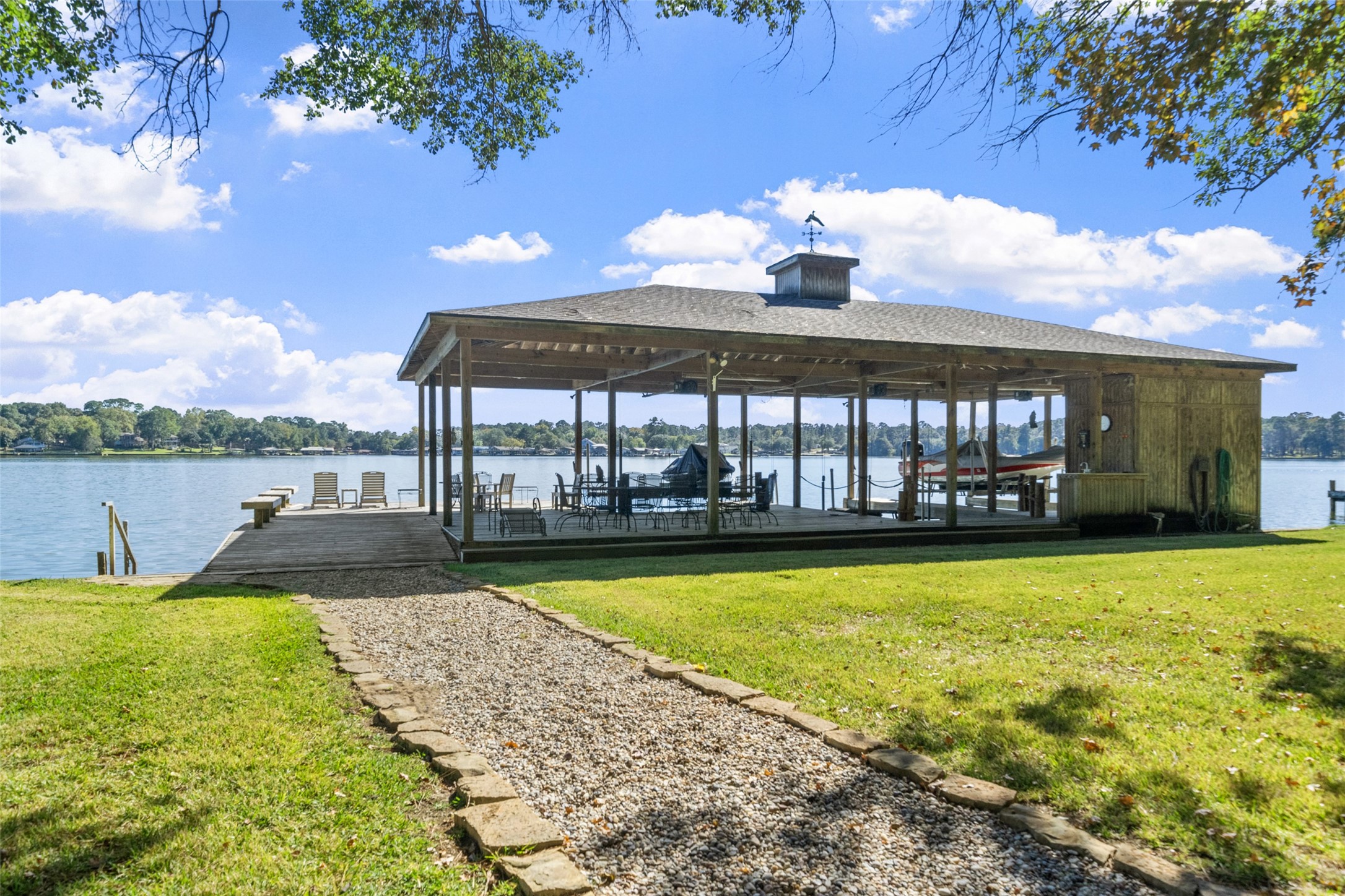 15144 Paradise View Drive Willis, TX 77318 - Photo 36 of 44 a view of a swimming pool with seating space