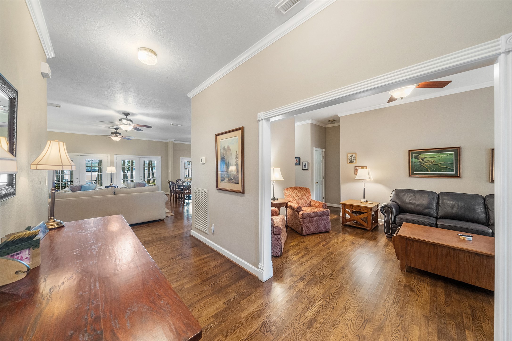 15144 Paradise View Drive Willis, TX 77318 - Photo 6 of 44 a living room with furniture and a wooden floor