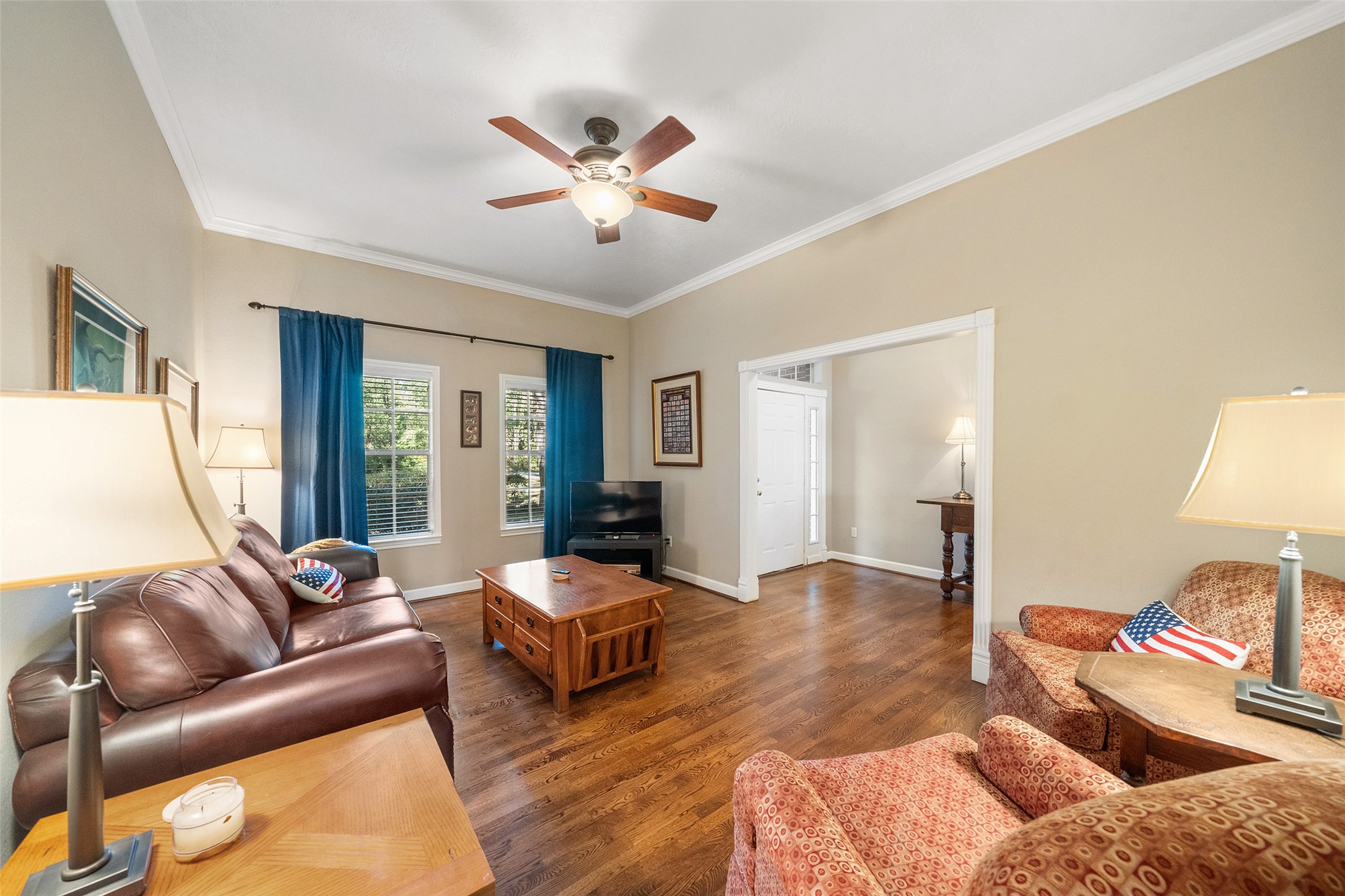 15144 Paradise View Drive Willis, TX 77318 - Photo 8 of 44 a living room with furniture and wooden floor