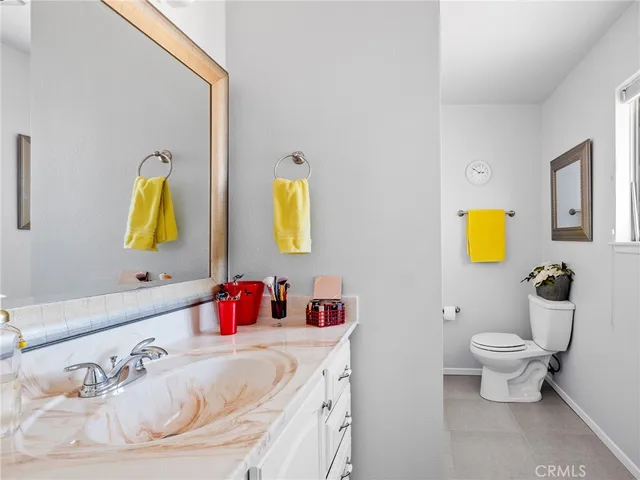 a bathroom with a sink and toilet