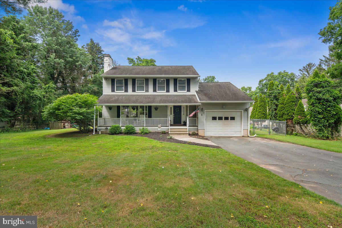 8 High Acres Drive Ewing, NJ 08628 - Photo 1 of 43 a front view of a house with a garden