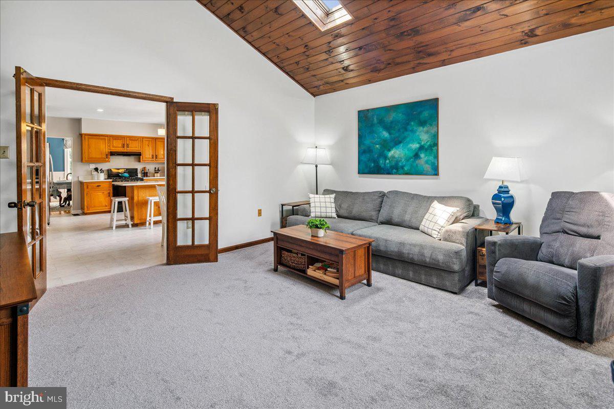 8 High Acres Drive Ewing, NJ 08628 - Photo 18 of 43 a living room with furniture and a flat screen tv
